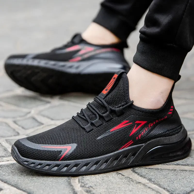 Men's mesh running shoes – model wearing black red sneakers