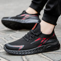 Men's mesh running shoes – model wearing black red sneakers