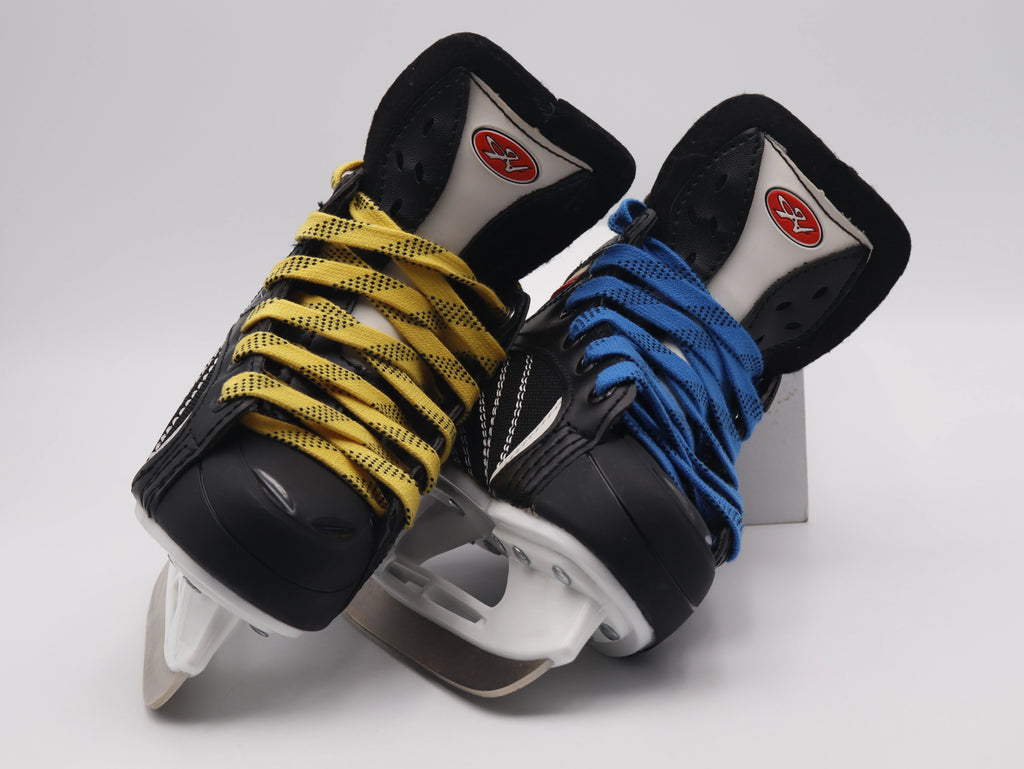 Yellow and blue waxed boot laces on ice skates