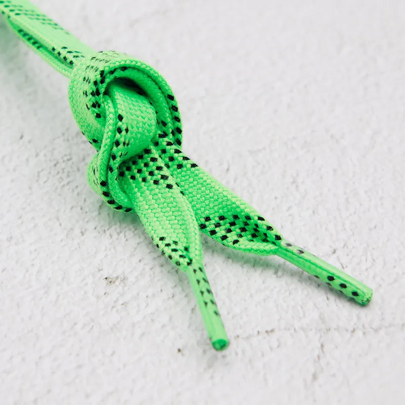 Green waxed boot laces close-up – waxed flat shoelaces