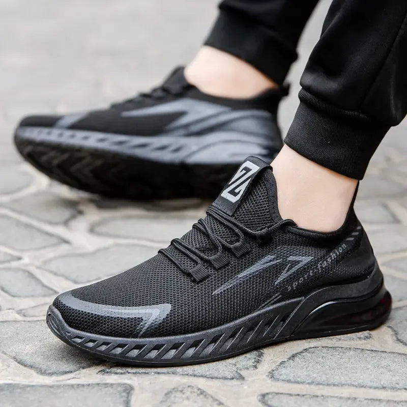Men's mesh running shoes – model wearing black sneakers