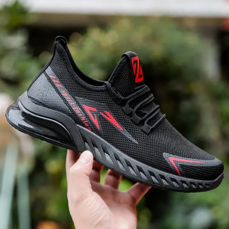 Men's mesh running shoes – black red sneaker held in hand