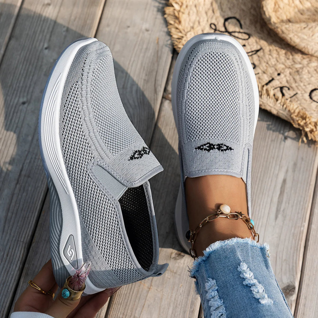 Grey womens running sneakers top view – slip-on shoes