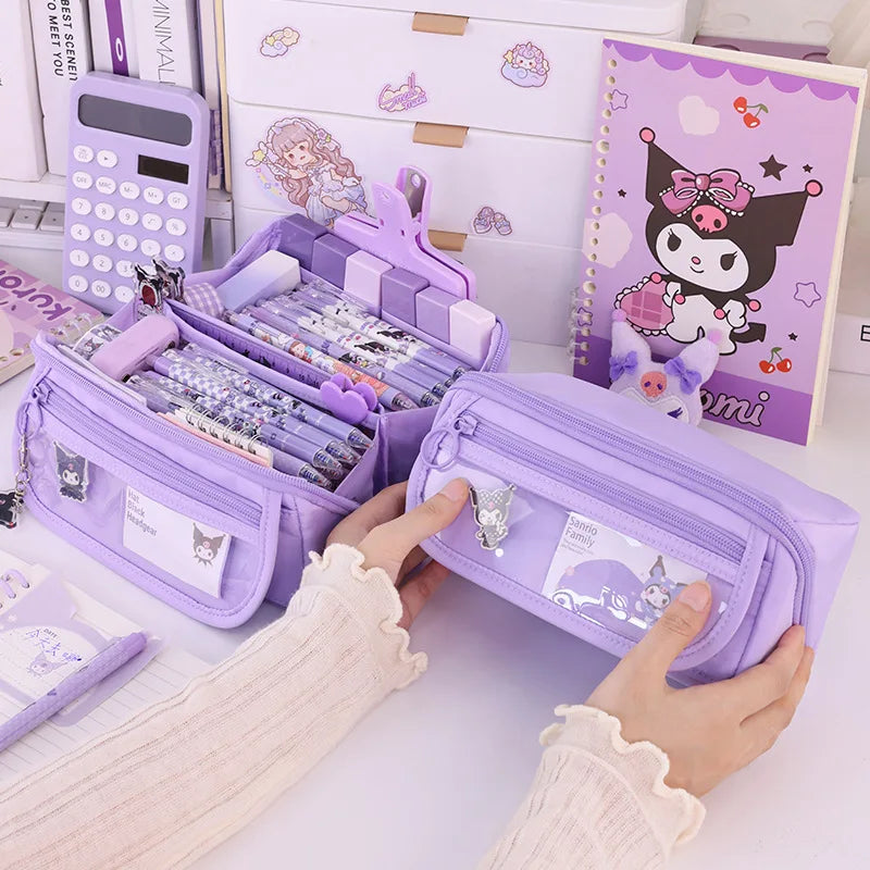 Hands holding large purple pencil case with zipper, open and closed