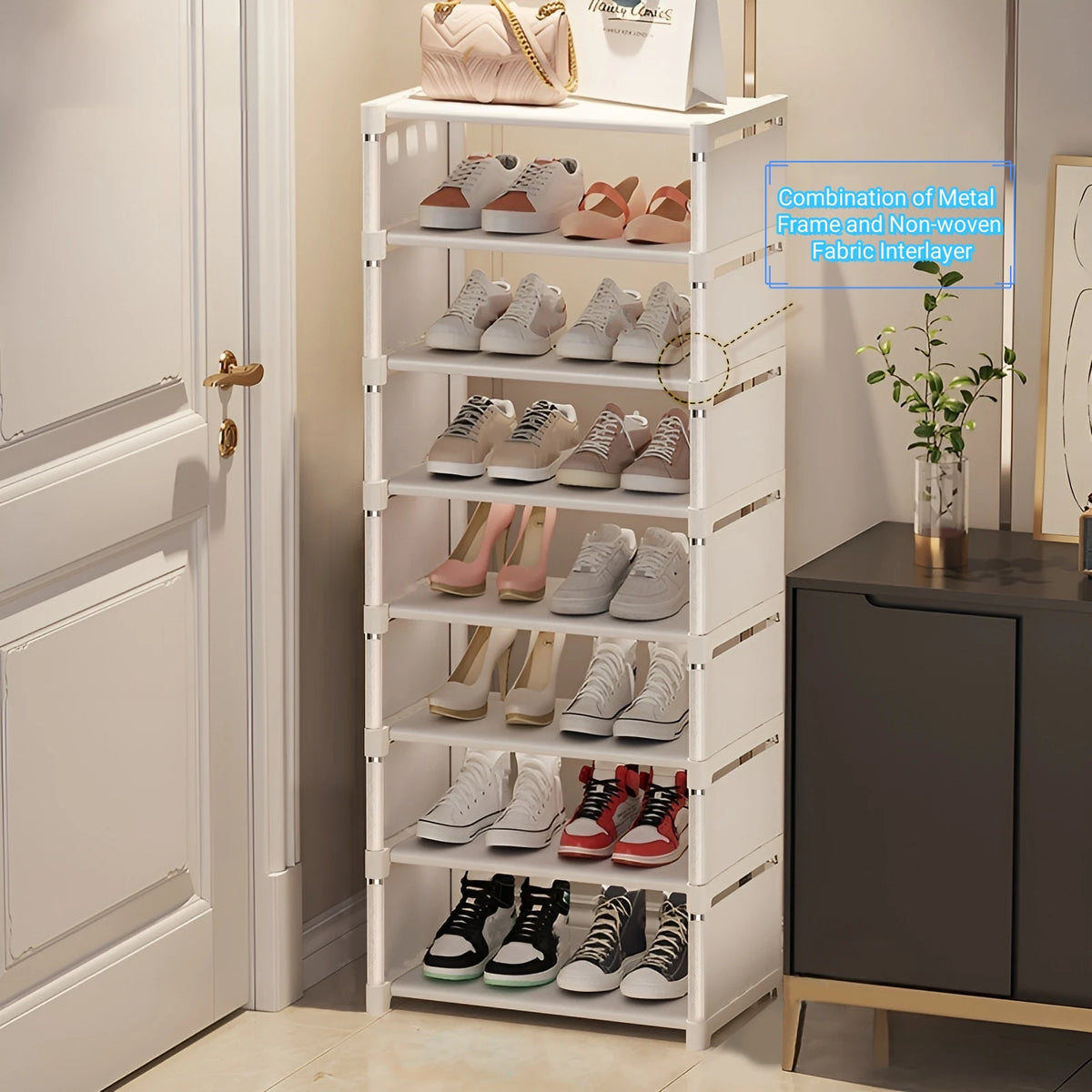 White 8-tier metal shoe rack organizer with fabric shelves in an entryway