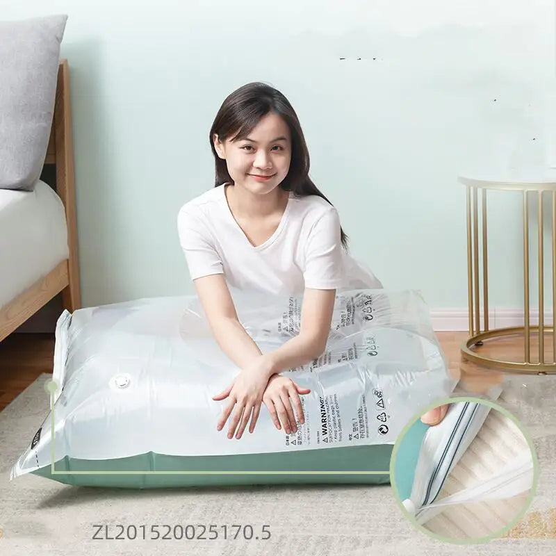 Woman sealing large vacuum storage bag for bedding