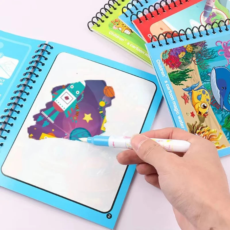 Child using water pen on magic water coloring book, blue ocean theme