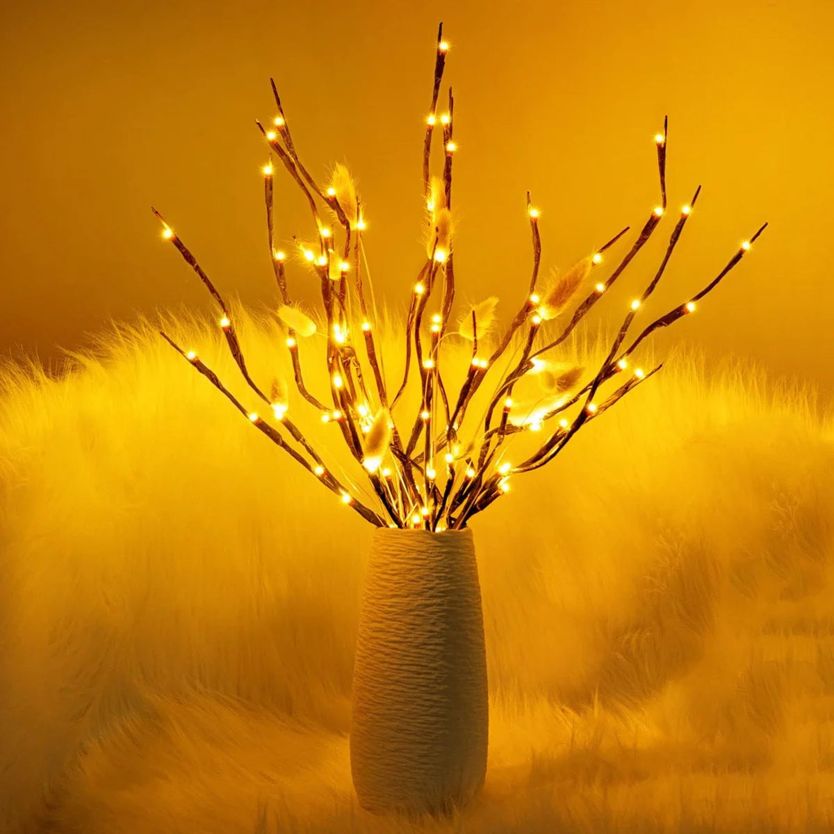 Birch branch fairy lights glowing warm white in vase