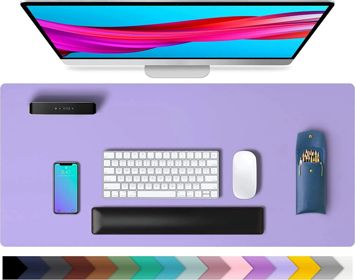 Purple leather desk pad with monitor, keyboard and color strip