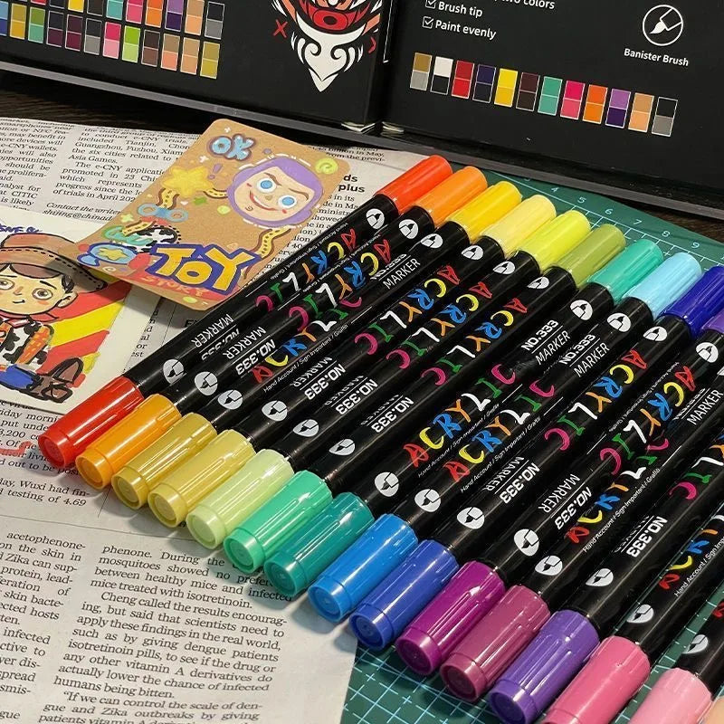 Acrylic paint markers dual tips laid out showing color range