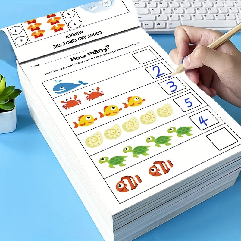Preschool math workbook — child tracing how many animals page