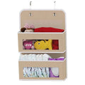 Beige 3-pocket hanging door organizer with toys, diapers and baby essentials